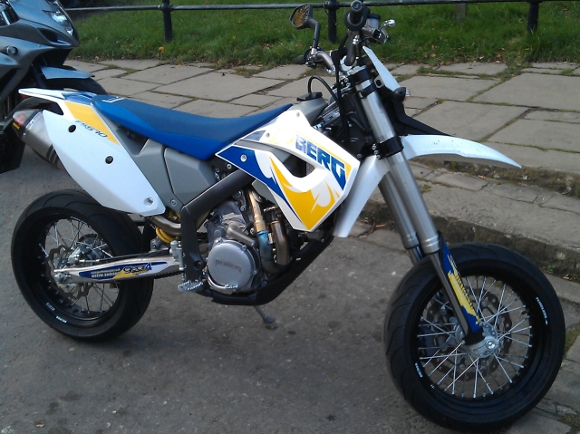 husaberg fs570 supermotord motorcycle in white, blue and yellow